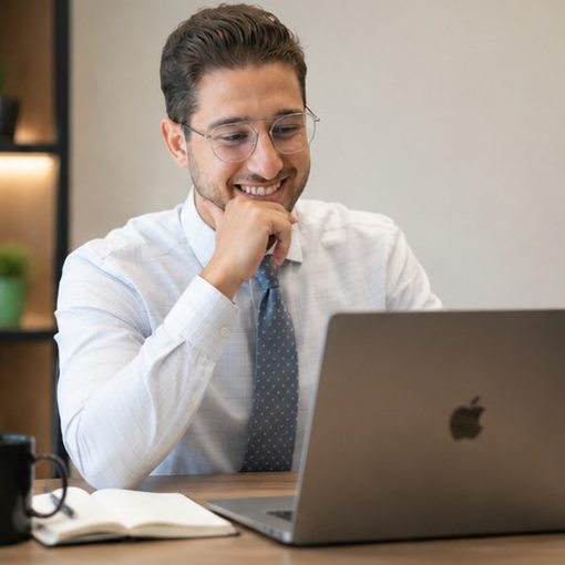 Jacob Suski working on a laptop at a desk